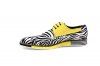 Modèle de sneaker Stripes, en nappa jaune et zèbre nappa.